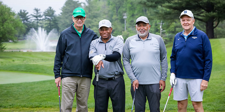 Four men at the GBMC Golf Classic