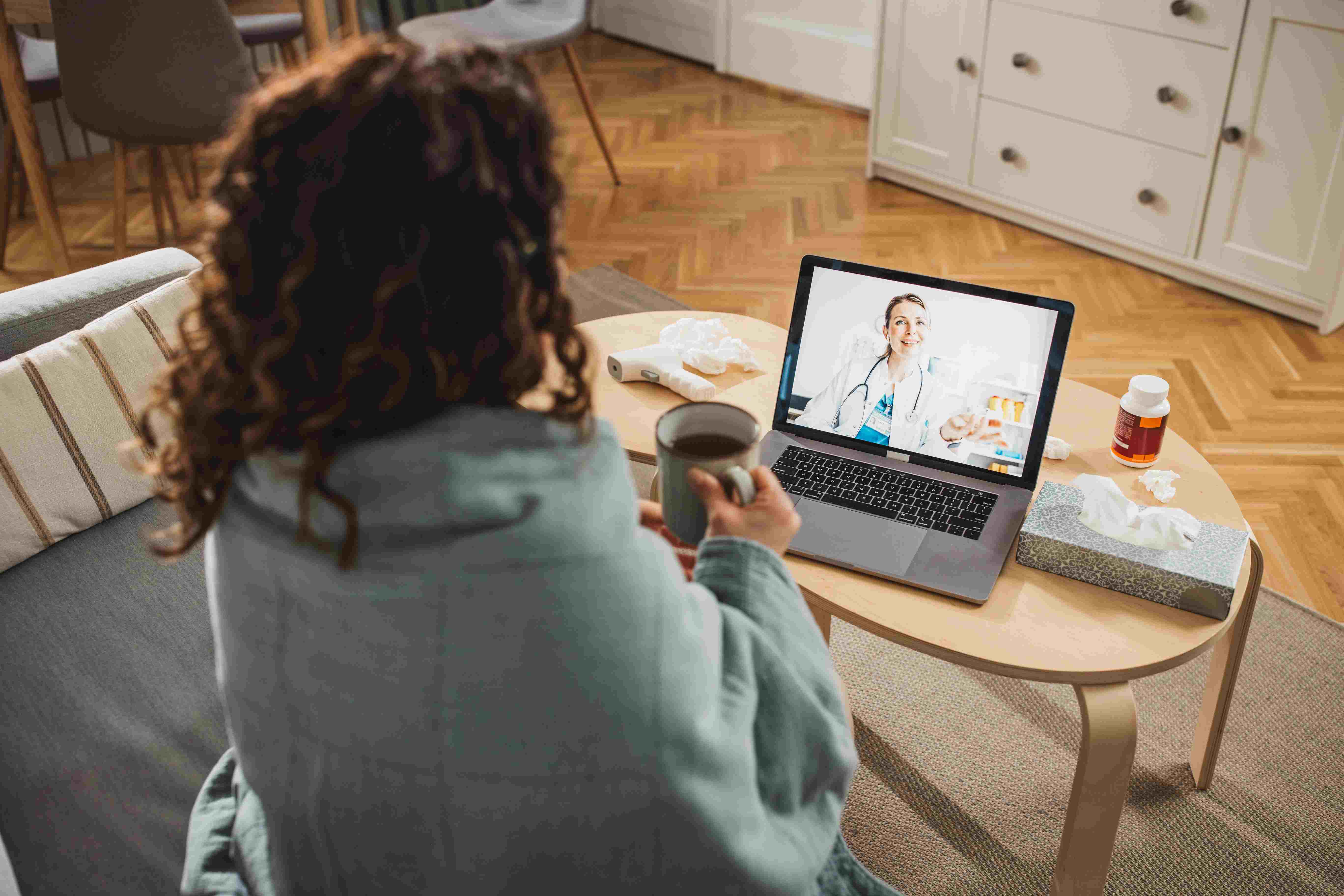 Woman using telemedicine for health care