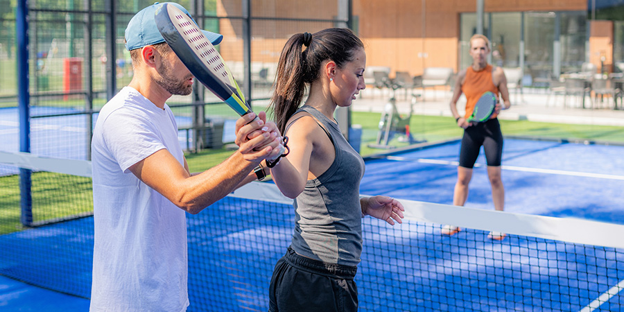 Woman stretching before playing pickleball