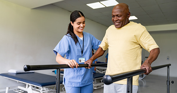 Image depticting a physical therapist and patient