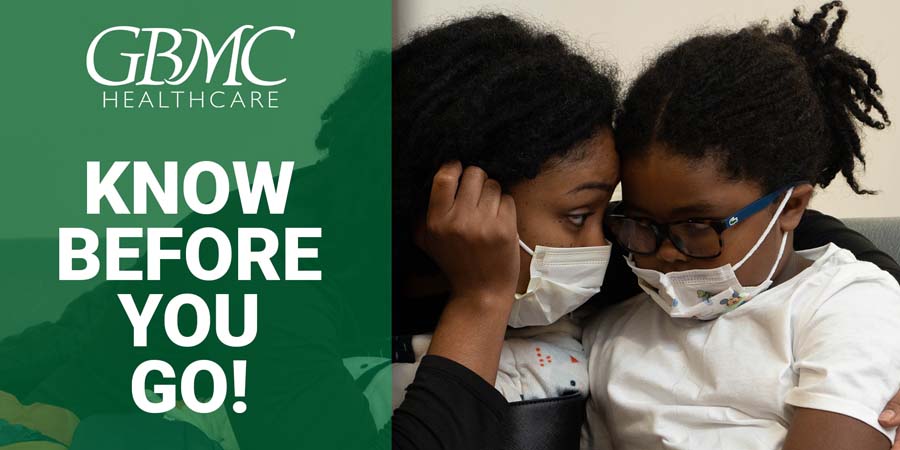 Mom comforting a child in the emergency room